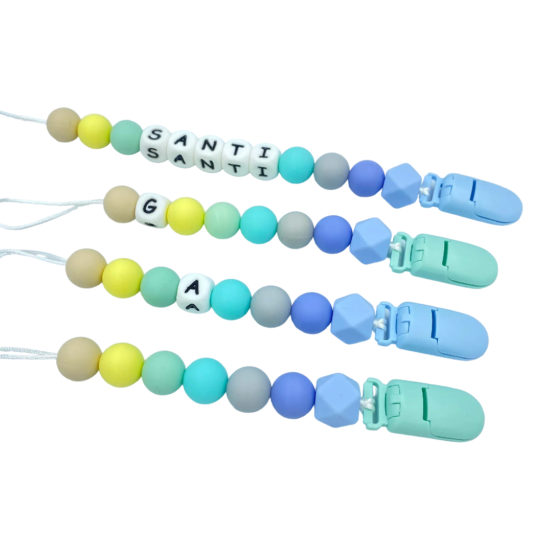 BabyMuu - Porta Chupetes - Accesorios - Arcoíris Niño - Nombre Personalizable - Cuencas Redondas